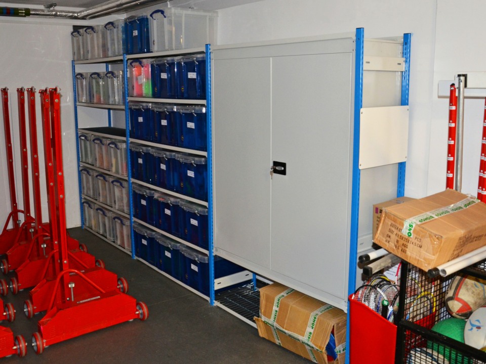 Trimline shelving with integrated industrial cupboard