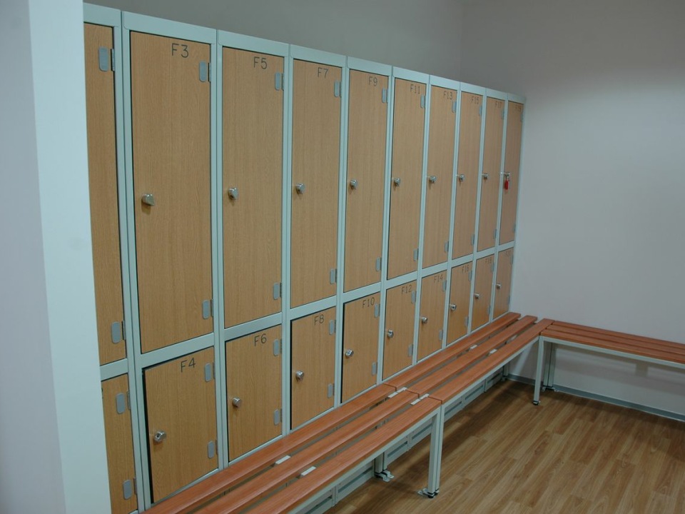 Changing room lockers with bench seating
