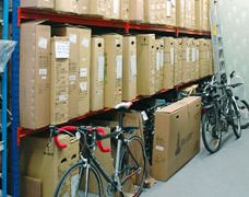Warehouse storage racking for boxed, unassembled bicycles