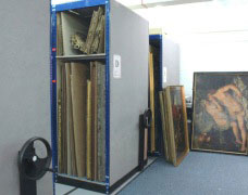 See how artwork can be stored using mobile picture racking