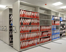 Lever Arch Files Housed Within Mobile Shelving Bays