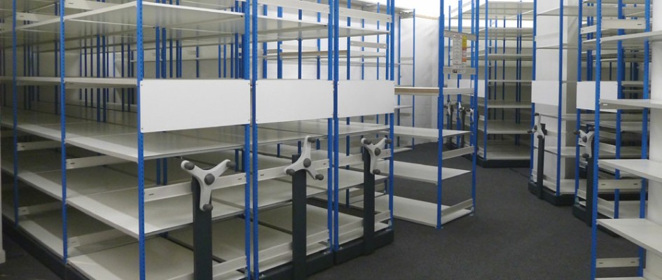 Movable Shelving Racks In a Stockroom Ready For Loading