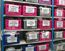 Storage Boxes Holding Lingerie On Shelves