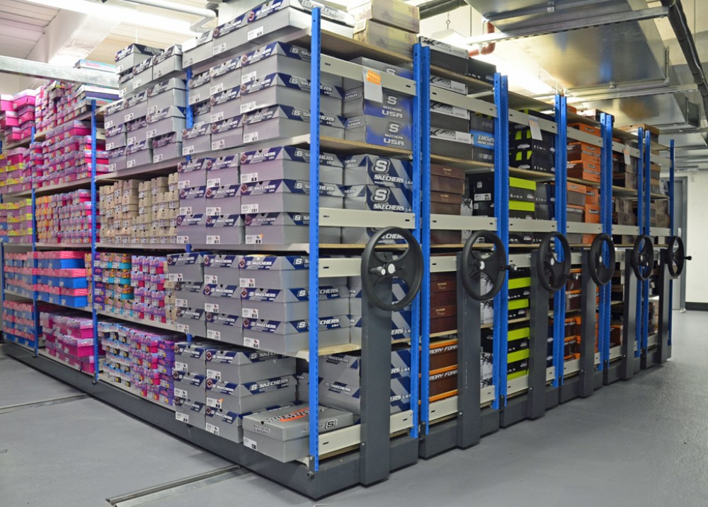 Shoe Box Shelving Mounted On Roller Racking Bases