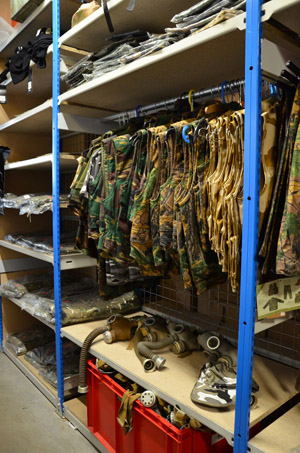 Garment hanging rail and shelving in one unit